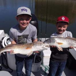 a person holding a fish